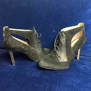 Black heels zipper on back and string up front